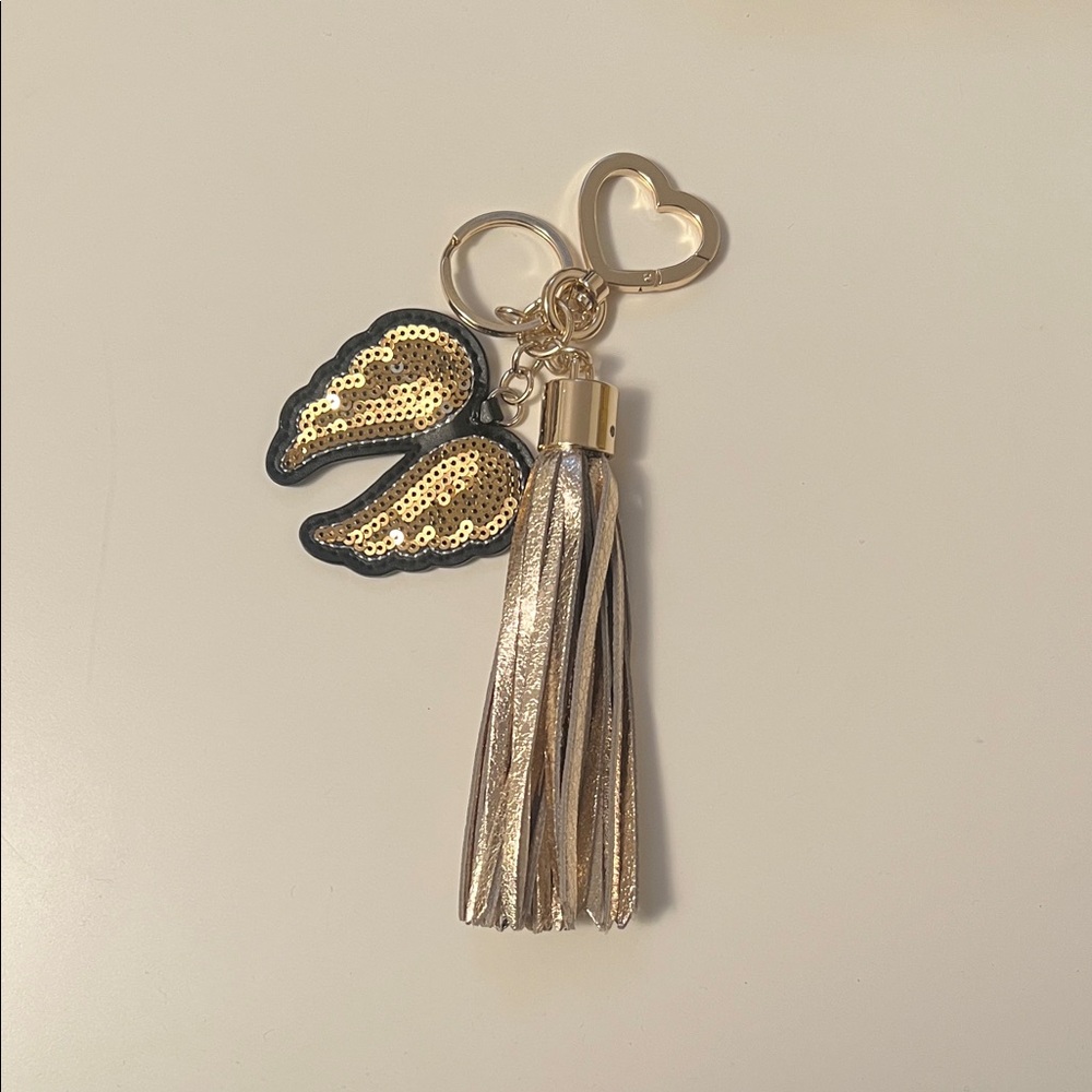 Victoria’s Secret: Gold and Black Winged Keychain with Tassel